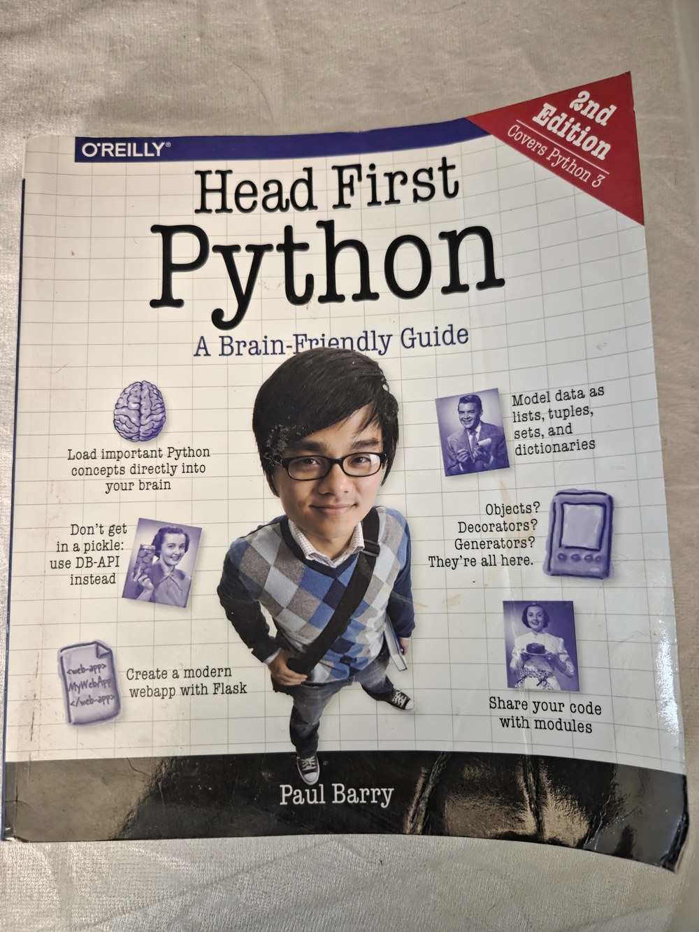 Head First Python by O'Reilly - White with Purple Accents